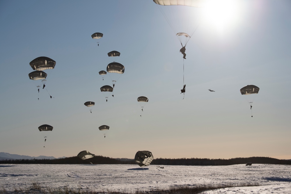 Army paratroopers and Marine Corps aviators conduct joint airborne training at JBER
