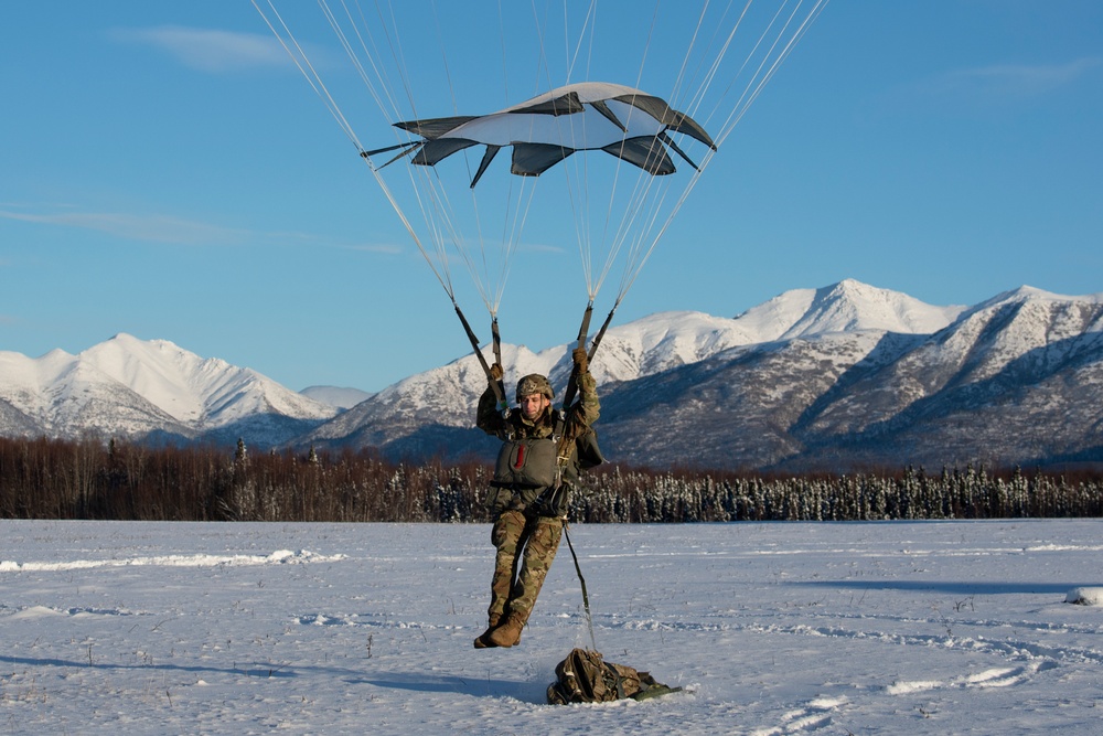 Army paratroopers and Marine Corps aviators conduct joint airborne training at JBER