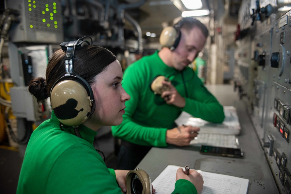 USS Ronald Reagan (CVN 76) Sailors operate catapult systems