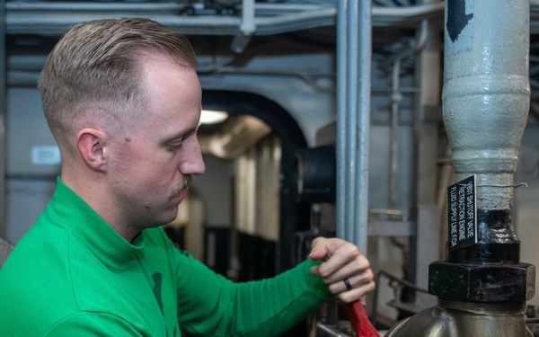 USS Ronald Reagan (CVN 76) Sailors operate catapult systems