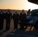 Funeral Honors Detail stand guard over the remains of Radioman 3rd Class Charles A. Montgomery's they are secured for transport in a hearse bound for his final resting place.