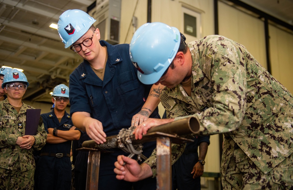 Sailors Serve Aboard USS Carl Vinson (CVN 70)