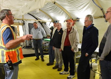 USACE employees and contractors visit a cleanup site on Redstone Arsenal during their quarterly RCWM meeting.