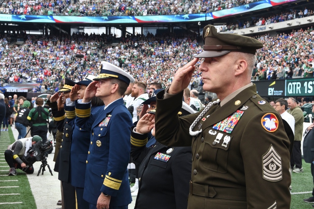 New Jersey National Guard Soldiers hold the American Flag along side other  service members and veterans at MetLife Stadium in East Rutherford, New  Jersey, Nov. 6, 2022. Soldiers of the New Jersey