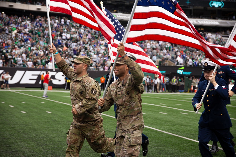 DVIDS - Images - Service Members Unfurl Flag at NY Jets First Home