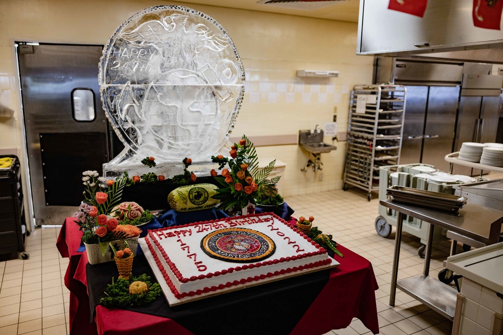 US Marines, Sailors, and civilians celebrate the 247th Marine Corps Birthday at the Camp Foster Mess Hall