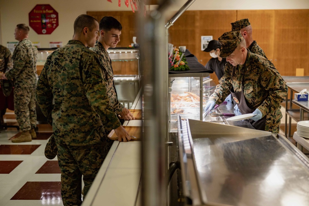 US Marines, Sailors, and civilians celebrate the 247th Marine Corps Birthday at the Camp Foster Mess Hall
