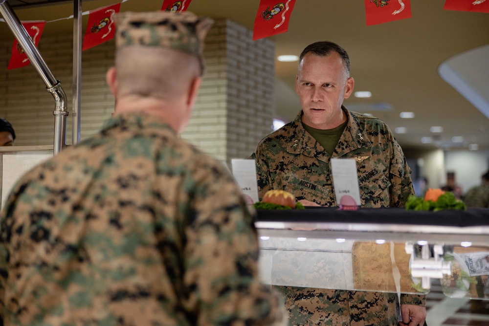 US Marines, Sailors, and civilians celebrate the 247th Marine Corps Birthday at the Camp Foster Mess Hall