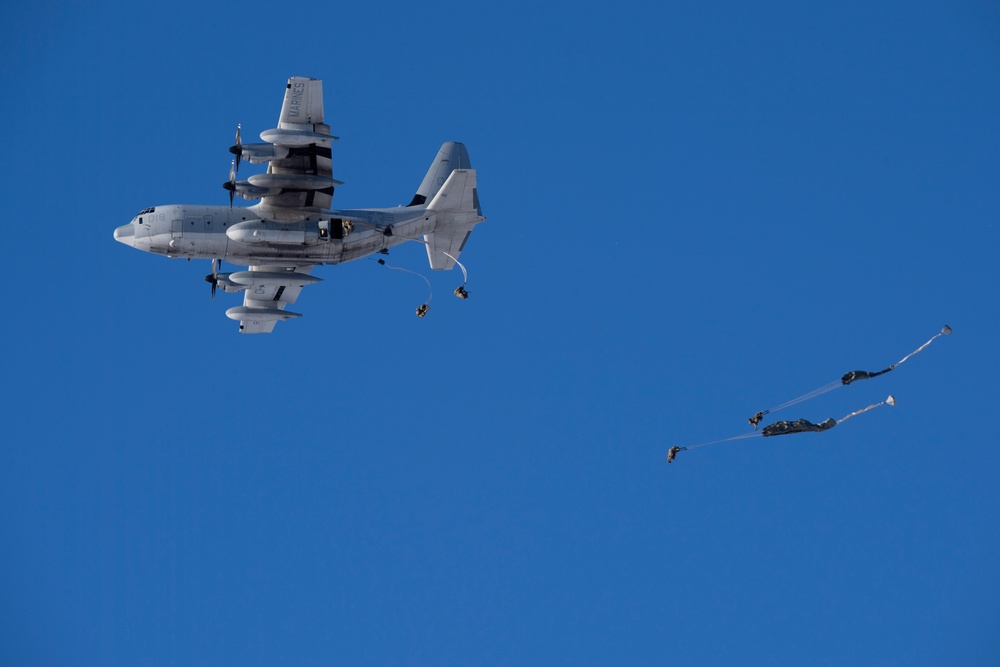 Army paratroopers and Marine Corps aviators conduct joint airborne training at JBER