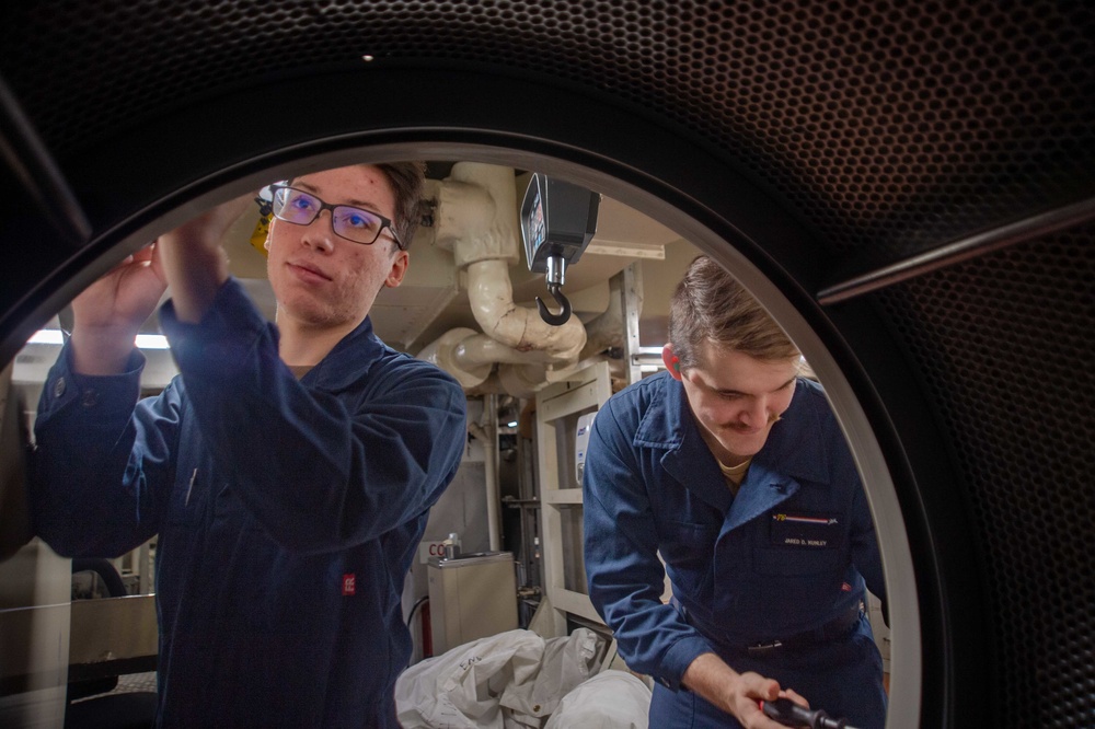 USS Ronald Reagan (CVN 76) Sailors conduct underway maintenance