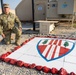 Sgt. Rios Paints Hellfighters Logo in the Stone