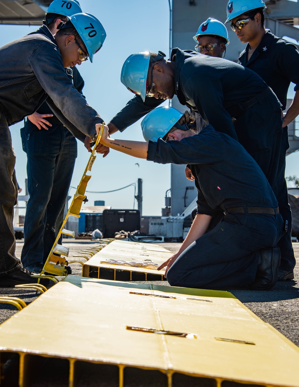 Sailor prepare for barricade rigging drills