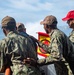 Sailors run damage control drills on the fantail of USS Carl Vinson