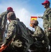 Sailors run damage control drills on the fantail of USS Carl Vinson