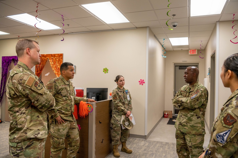 Chief Master Sgt. Tyrone McDougald and Senior Master Sgt. Yue Yan Huang visit the 1st Special Operations Medical Group