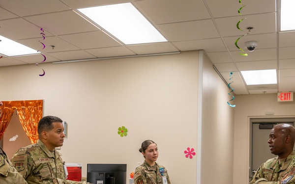 Chief Master Sgt. Tyrone McDougald and Senior Master Sgt. Yue Yan Huang visit the 1st Special Operations Medical Group