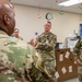 Chief Master Sgt. Tyrone McDougald and Senior Master Sgt. Yue Yan Huang visit the 1st Special Operations Medical Group