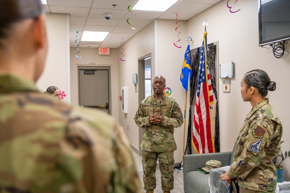 Chief Master Sgt. Tyrone McDougald and Senior Master Sgt. Yue Yan Huang visit the 1st Special Operations Medical Group