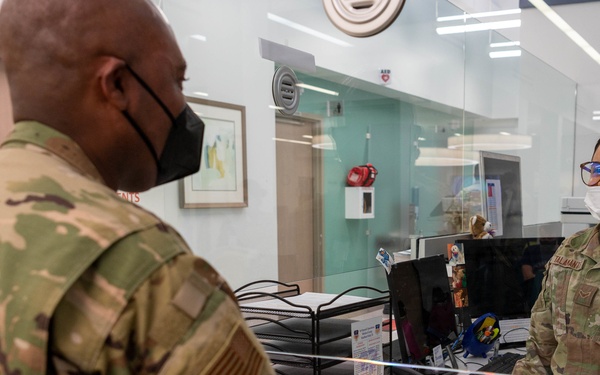 Chief Master Sgt. Tyrone McDougald and Senior Master Sgt. Yue Yan Huang visit the 1st Special Operations Medical Group