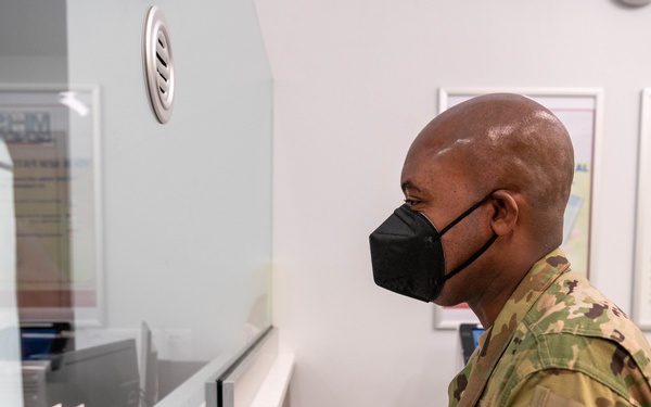 Chief Master Sgt. Tyrone McDougald and Senior Master Sgt. Yue Yan Huang visit the 1st Special Operations Medical Group