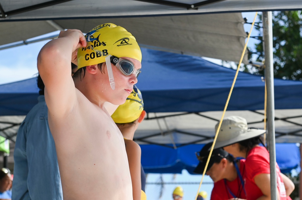 Local swim teams dive back into competition at Andersen AFB