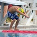 Local swim teams dive back into competition at Andersen AFB