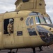 Senior Leaders observe CH-47 Chinook sling load a M777 Howitzer