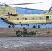 Senior Leaders observe CH-47 Chinook sling load a M777 Howitzer