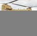 Senior Leaders observe CH-47 Chinook sling load a M777 Howitzer