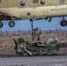 Senior Leaders observe CH-47 Chinook sling load a M777 Howitzer