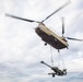 Senior Leaders observe CH-47 Chinook sling load a M777 Howitzer