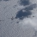 B-1B Lancers/A-10C Thunderbolts fly aerial integration sortie over Pacific Ocean