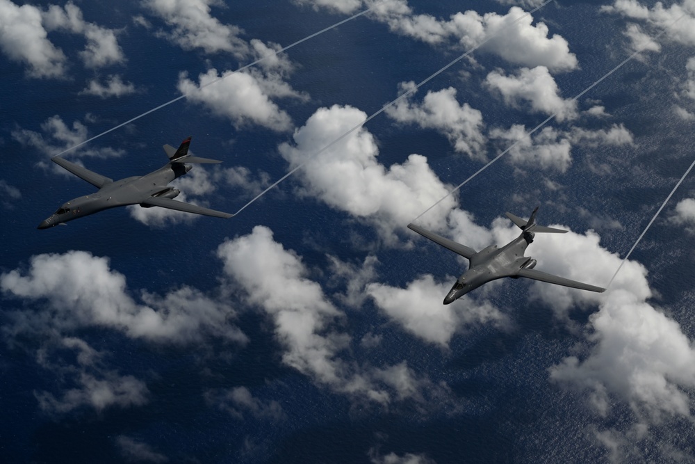 B-1B Lancers/A-10C Thunderbolts fly aerial integration sortie over Pacific Ocean