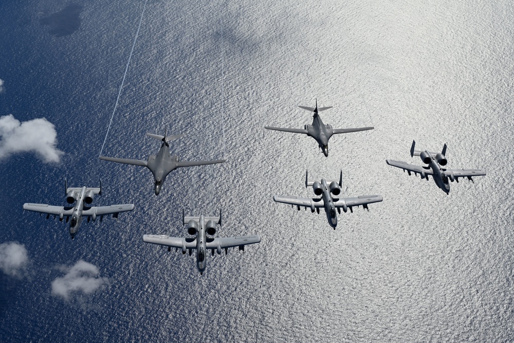 B-1B Lancers/A-10C Thunderbolts fly aerial integration sortie over Pacific Ocean