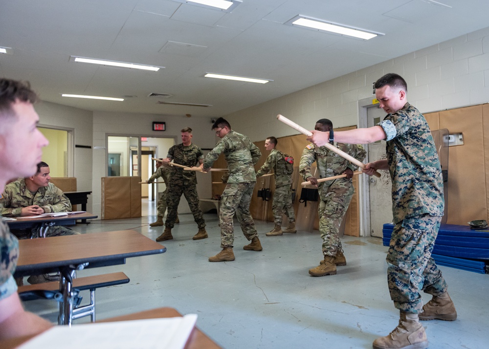 Soldiers, Marines train side by side to become Corrections and Detention Specialists