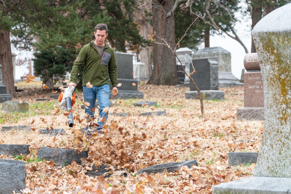 Airmen cleanup local cemetery