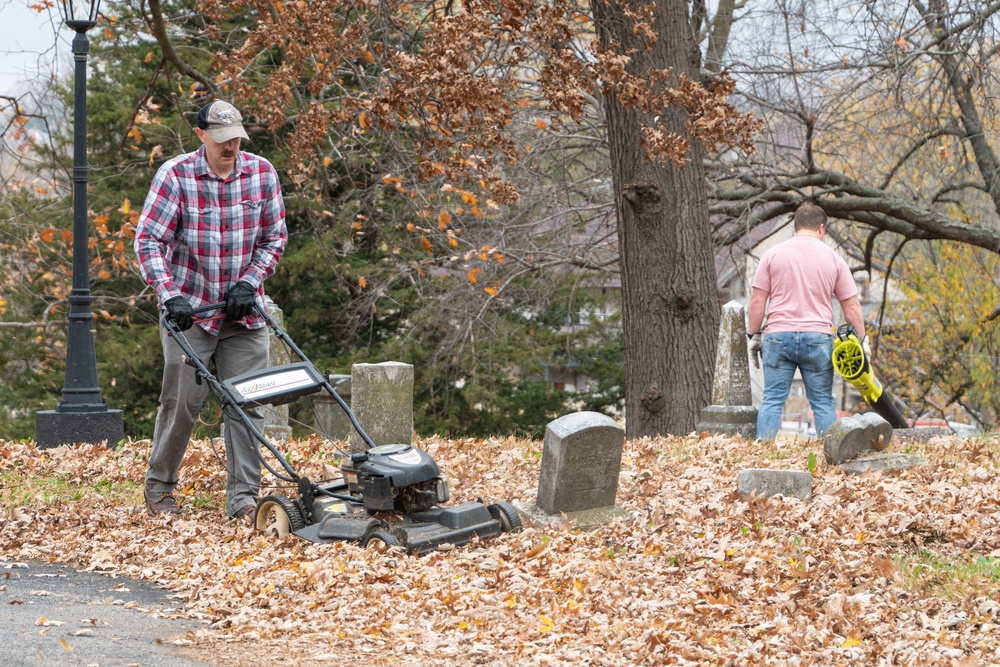 Airmen cleanup local cemetery