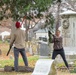 Airmen cleanup local cemetery