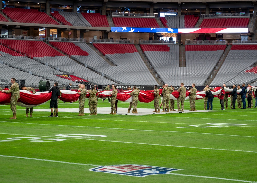 Military members participate Salute to Service game at State Farm Stadium