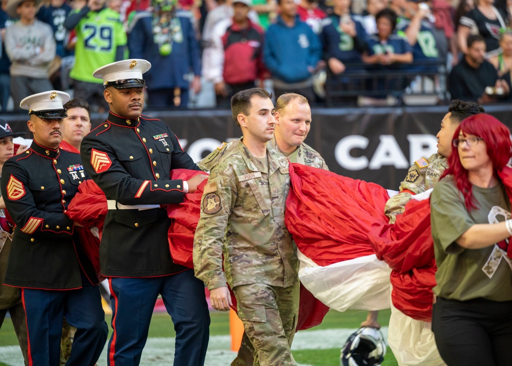 Military members participate Salute to Service game at State Farm Stadium