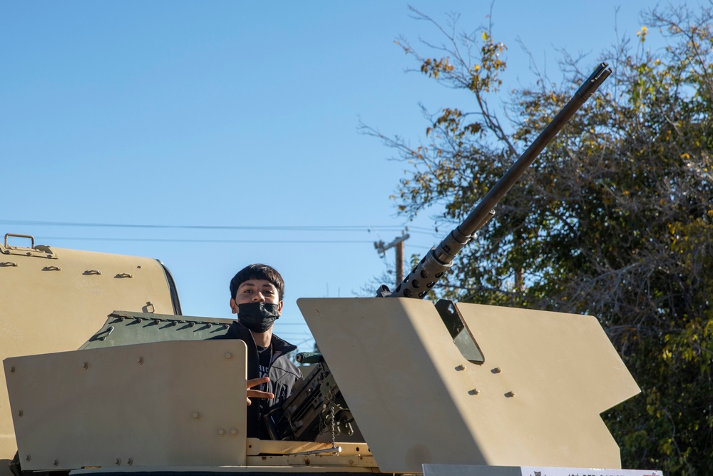 Local youth poses for the camera during Fabens Park Veterans Day Ceremony event