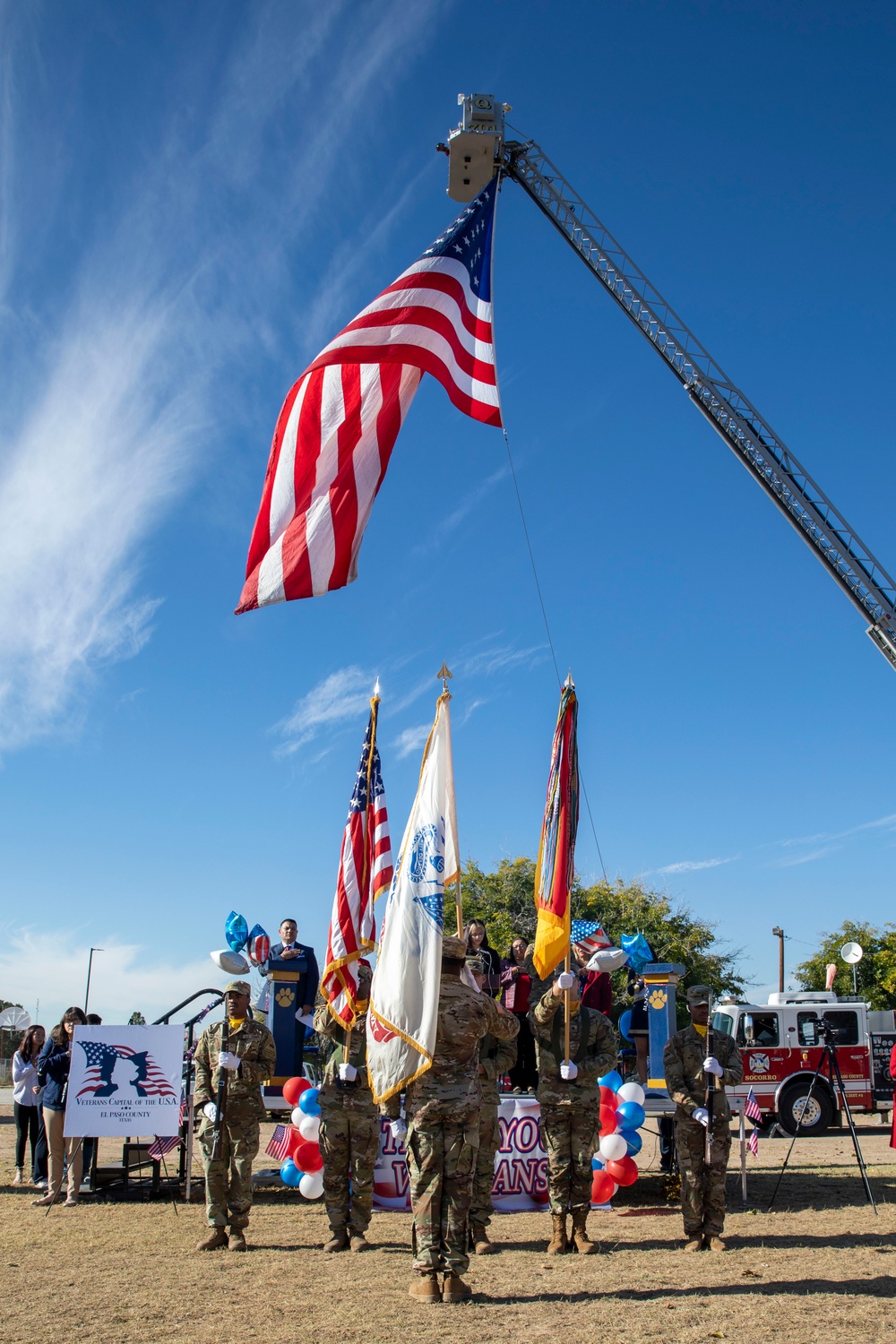 1st Armored Division color guard present arms at Fabens Park Veterans Day Ceremony