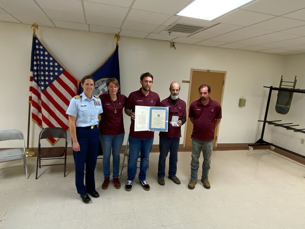 Coast Guard presents public service awards to mariners for fire response