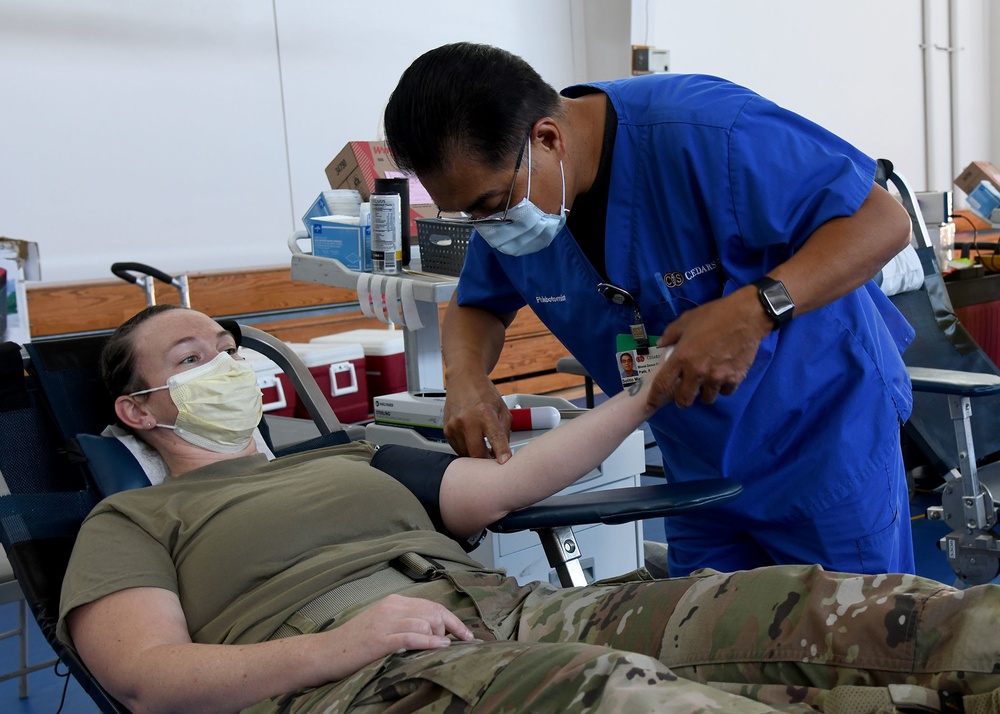 Los Angeles Air Force Base personnel participate in a blood drive in coordination with local non-profit hospital