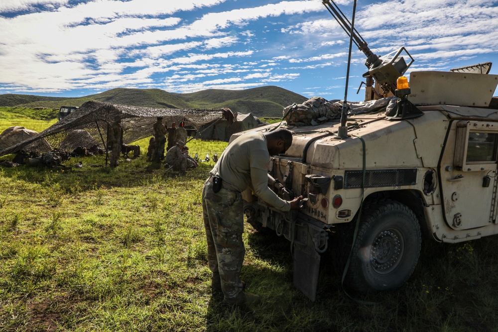 Military police Soldiers form the 728th Military Police Battalion, 8th Military Police Brigade, conduct preventive maintenance on their vehicles during exercise Joint Pacific Multinational Readiness Center 23