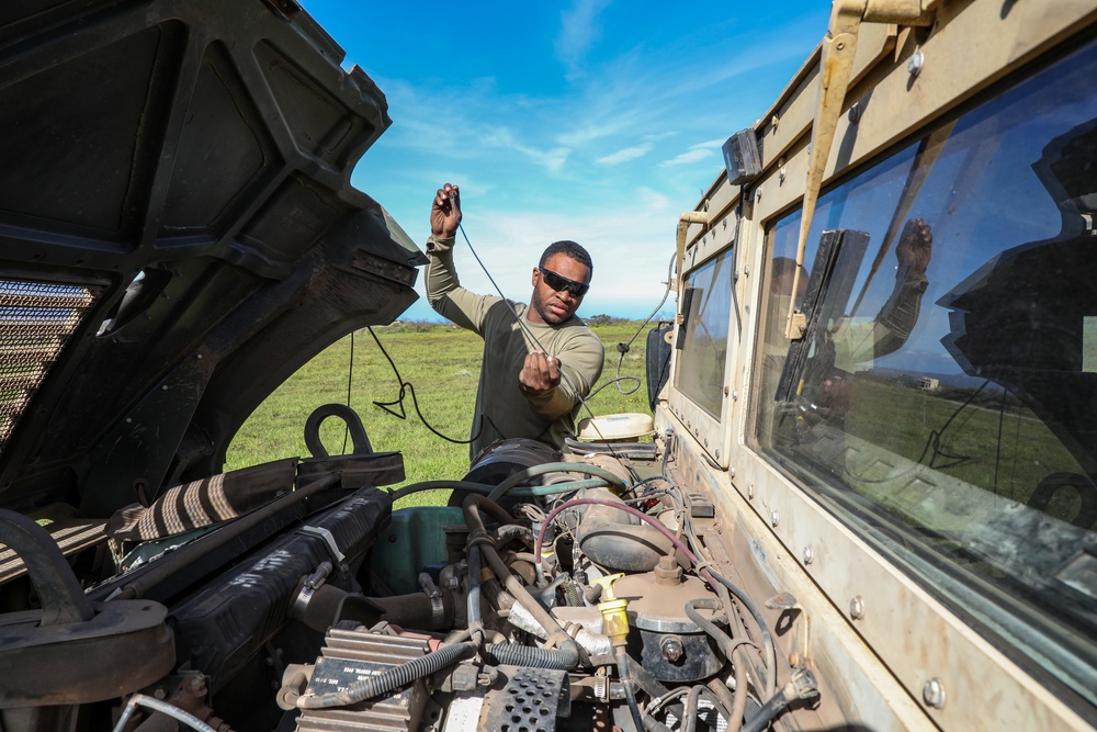 Military police Soldiers form the 728th Military Police Battalion, 8th Military Police Brigade, conduct preventive maintenance on their vehicles during exercise Joint Pacific Multinational Readiness Center 23