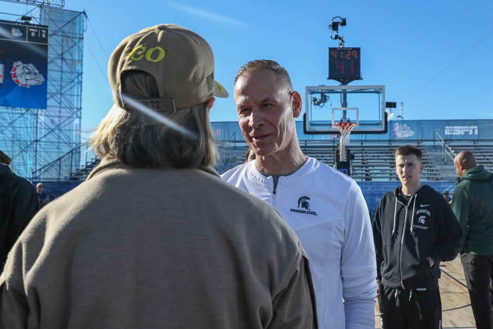 Michigan State University basketball players tour USS Abraham Lincoln