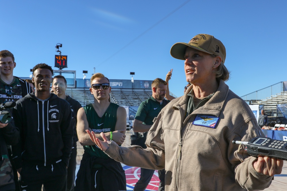 Michigan State University basketball players tour USS Abraham Lincoln