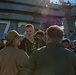 Michigan State University basketball players tour USS Abraham Lincoln