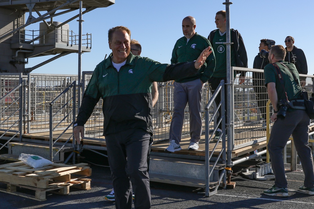 Michigan State University basketball players tour USS Abraham Lincoln